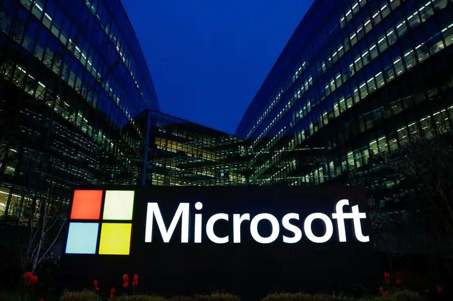 Microsoft logo with a cloud computing theme representing UK lawsuit over licensing fees - Global Banking & Finance Review