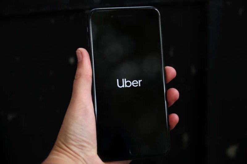 Image for British watchdog probing Uber-Autocab deal over competition concerns