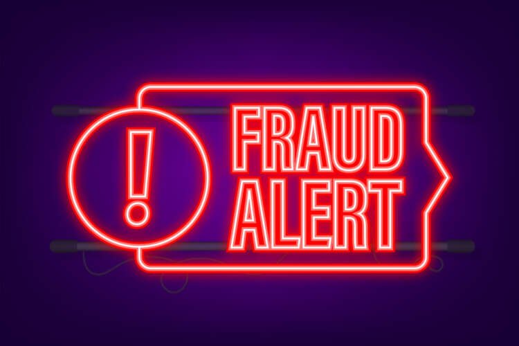 Neon fraud alert icon representing online security challenges in banking - Global Banking & Finance Review