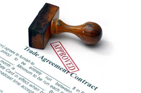 International trade contract illustrating sanctions impact on global business - Global Banking & Finance Review