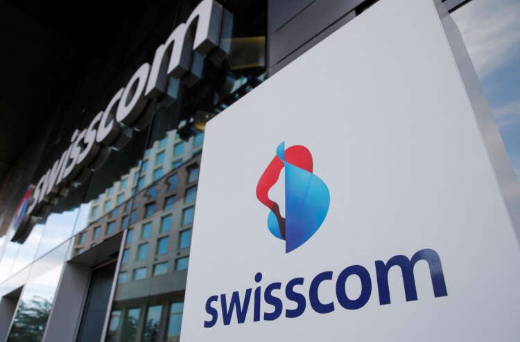 Swisscom logo displayed on an office building in Zurich, highlighting telecom growth - Global Banking & Finance Review