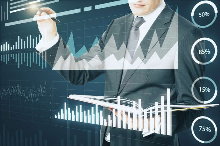 Business professionals analyzing data for growth and risk management in financial services - Global Banking & Finance Review