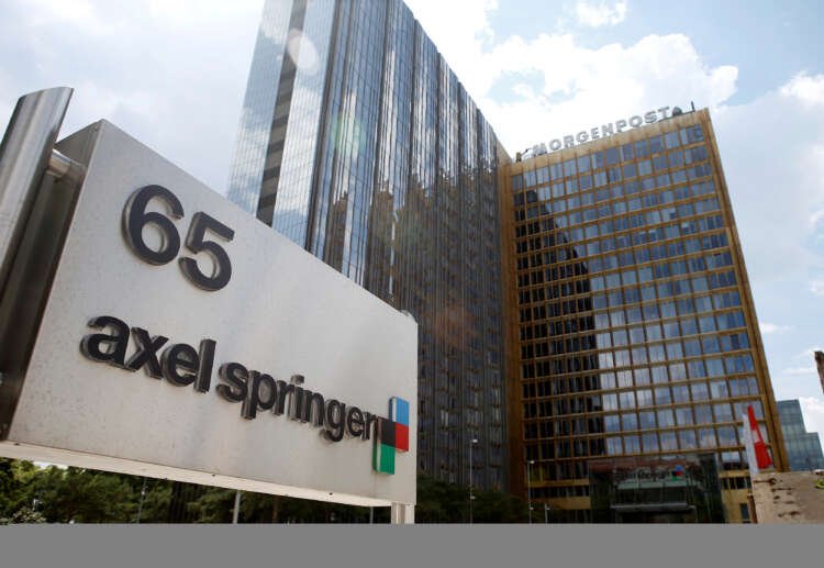 Axel Springer logo at headquarters, symbolizing AI acquisition strategy - Global Banking & Finance Review
