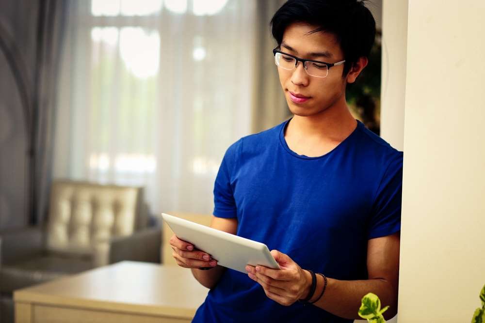 A person analyzing financial charts and planning for a business startup with limited funds - Global Banking & Finance Review