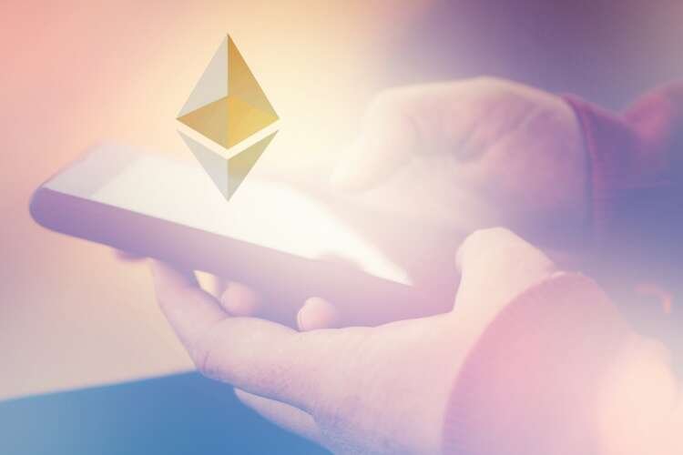 Mobile phone displaying Ethereum trading platform and cryptocurrency trends - Global Banking & Finance Review