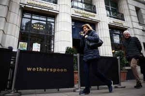 Exterior view of a J D Wetherspoon pub showcasing its vibrant atmosphere - Global Banking & Finance Review