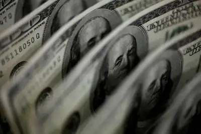 Image for Dollar holds near one-month low as investors eye U.S. jobs, RBA