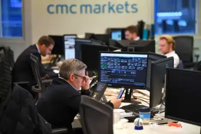 Image for Online broker CMC sounds profit warning as market volatility eases