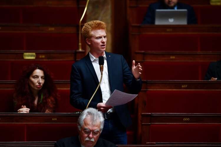 FILE PHOTO: French member of parliament of the leftist La France Insoumise (LFI) party Adrien Quatennens speaks during a session of questions to the Government at the French National Assembly in Paris
