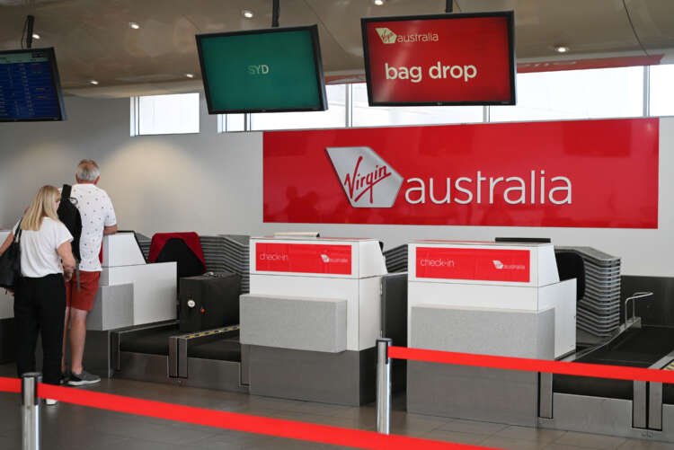 Passengers at Virgin Australia Airlines counter amid capacity issues - Global Banking & Finance Review
