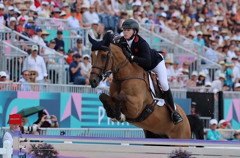 Britain's equestrian team celebrates winning gold in team jumping at the Olympics - Global Banking & Finance Review