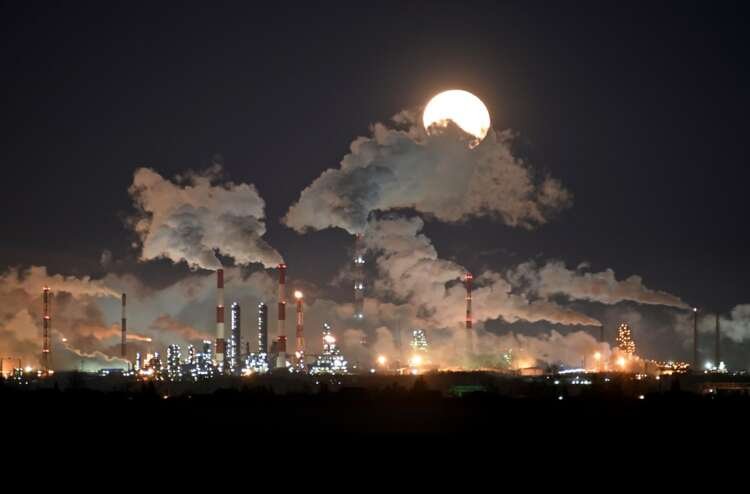 Full moon rises over the Gazprom Neft’s oil refinery in Omsk