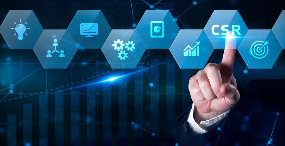 Business team discussing effective CSR strategies in finance - Global Banking & Finance Review