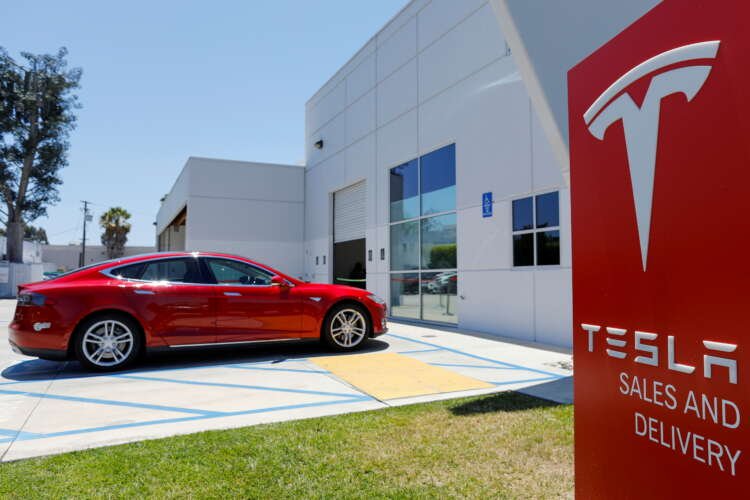 Tesla electric cars on display, highlighting price changes in the U.S. and China - Global Banking & Finance Review
