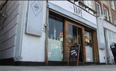 E-cigarette device with vapor, symbolizing the vaping trend in the UK - Global Banking & Finance Review