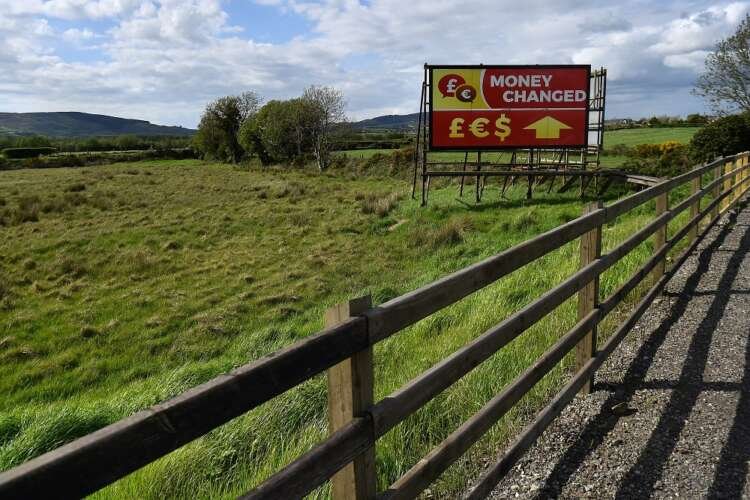 Border landscape symbolizing Northern Ireland and Ireland amid Brexit tensions - Global Banking & Finance Review
