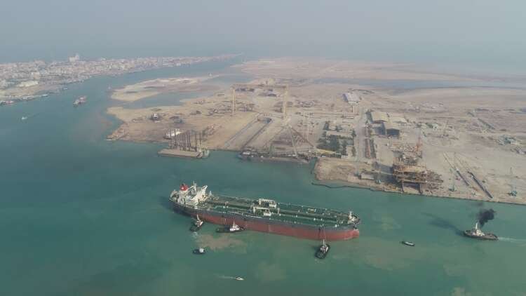A large oil tanker near Bushehr coast, symbolizing oil supply concerns amid Iran deal negotiations - Global Banking & Finance Review