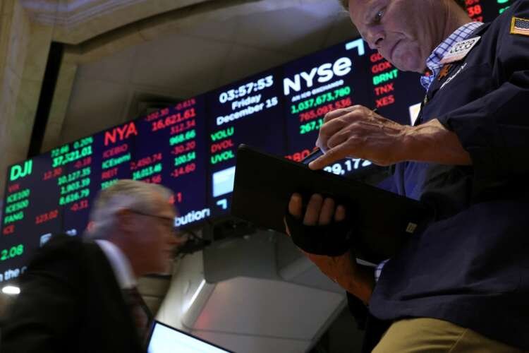 Traders monitor stock prices on the NYSE floor amid rising global stock markets - Global Banking & Finance Review