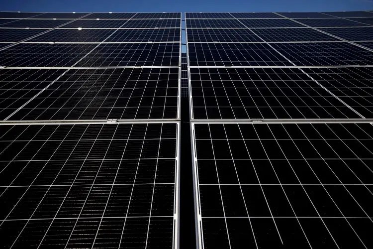 Solar panels installed on a factory roof in Germany, showcasing renewable energy in industry - Global Banking & Finance Review