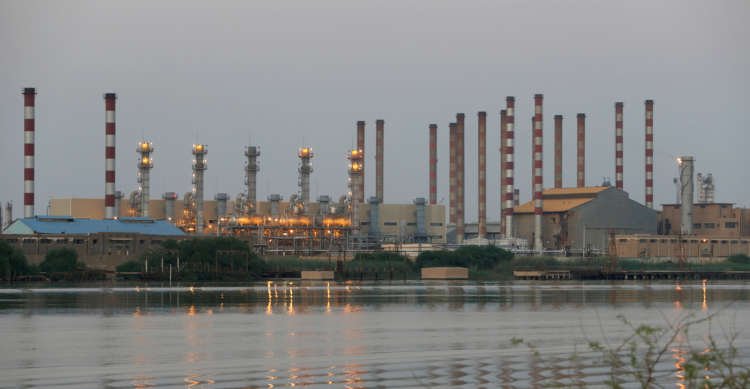 FILE PHOTO: FILE PHOTO: A general view of Abadan oil refinery in southwest Iran, is pictured from Iraqi side of Shatt al-Arab in Al-Faw south of Basra