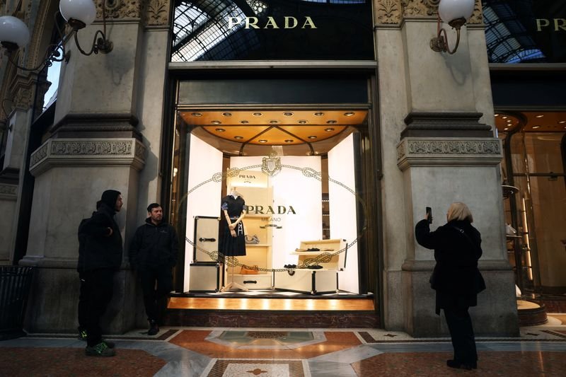 Prada's logo symbolizing its exclusive access to Versace financial data - Global Banking & Finance Review