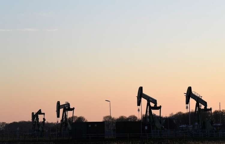 FILE PHOTO: Pump jacks on an oil field in Emlichheim