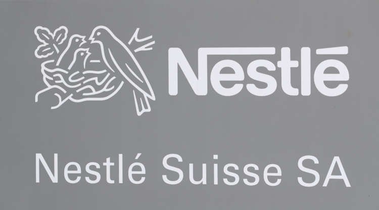 Nestle logo displayed prominently, symbolizing potential sale of Poland Spring water brand - Global Banking & Finance Review