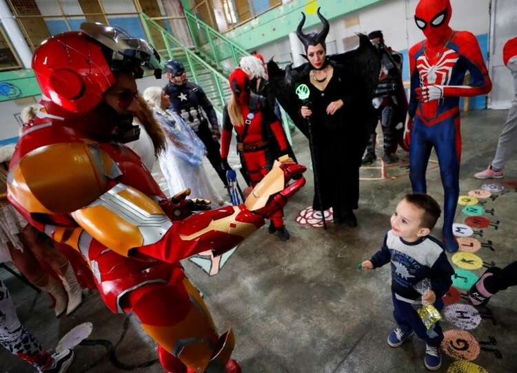 Superheroes including Batman and Princess Elsa bring joy to children in an Argentine prison - Global Banking & Finance Review