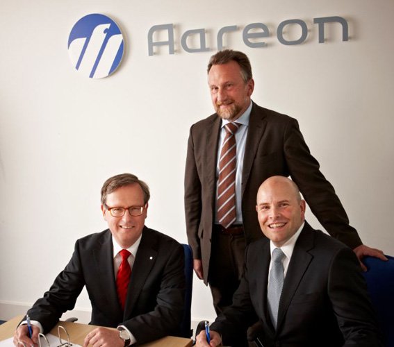 Illustration of Aareal Bank's acquisition of 1st Touch, enhancing mobile technology in property sector - Global Banking & Finance Review