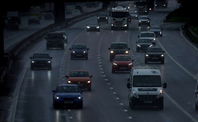 Traffic on the M6 motorway representing Britain's carbon emissions challenges - Global Banking & Finance Review