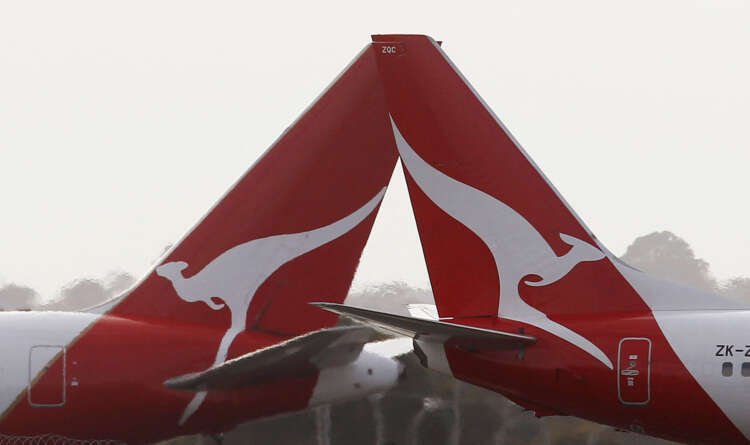 Qantas passenger jets at Sydney airport, related to Vanessa Hudson's CEO appointment - Global Banking & Finance Review