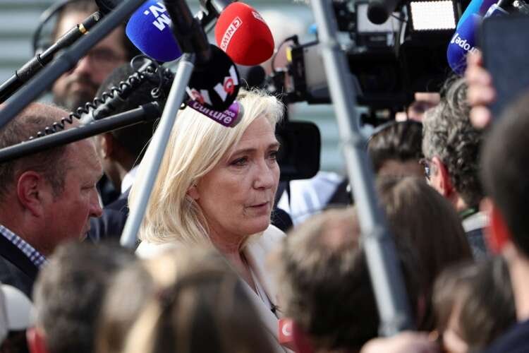 Marine Le Pen speaking at a campaign event addressing pension reforms - Global Banking & Finance Review