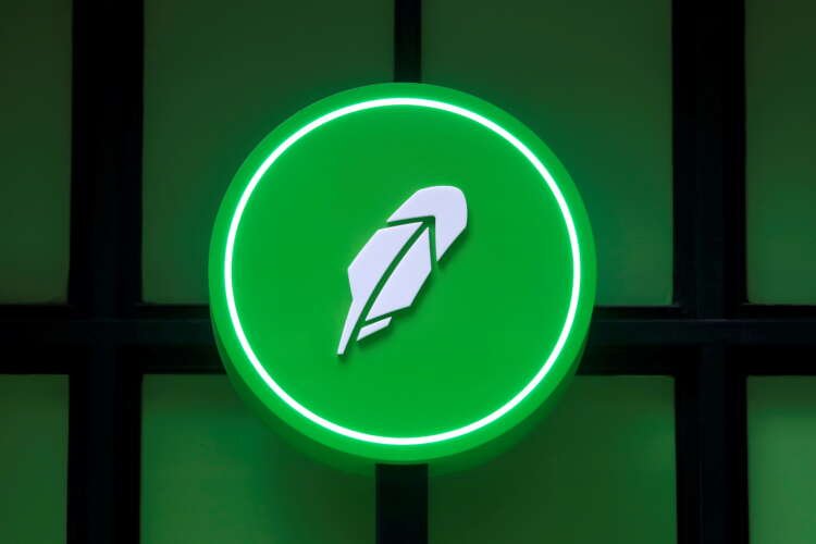 Robinhood logo with cryptocurrency symbols representing crypto wallets - Global Banking & Finance Review