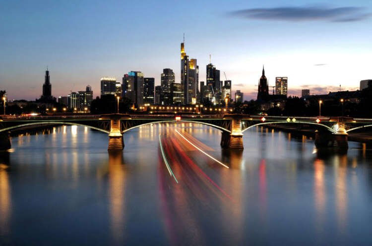 Skyline of Frankfurt with sunset, symbolizing Germany's economic challenges - Global Banking & Finance Review