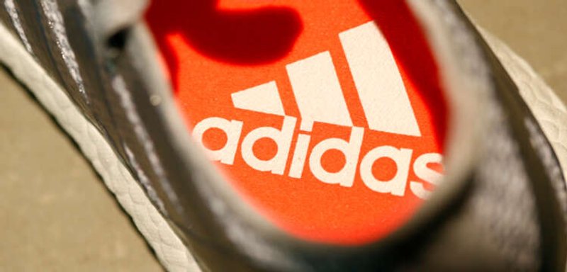 Image for Adidas slashes 2022 outlook after Kanye West split