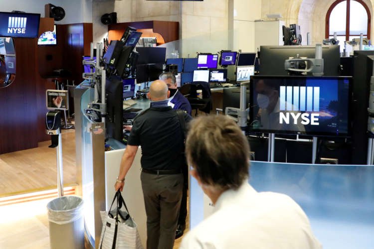 New York Stock Exchange bustling with activity during COVID-19 stock market fluctuations - Global Banking & Finance Review