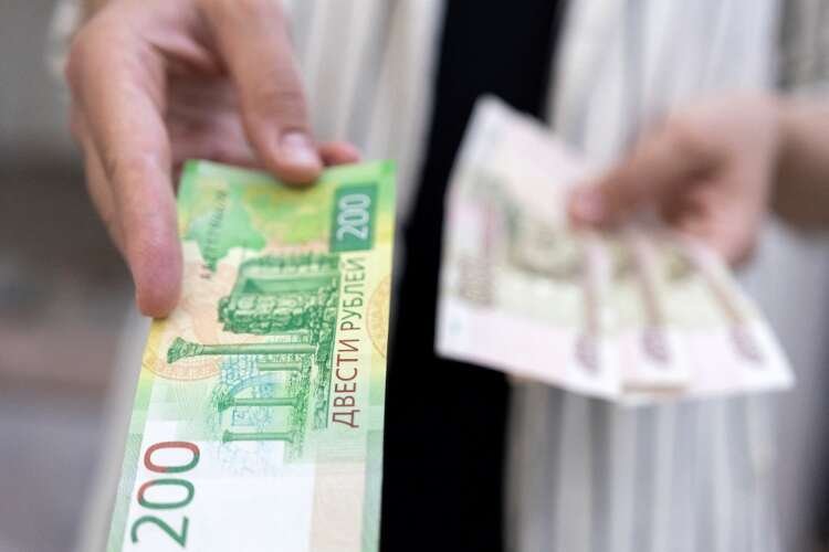 Image for Russian rouble eases towards 62 vs dollar, stocks fall