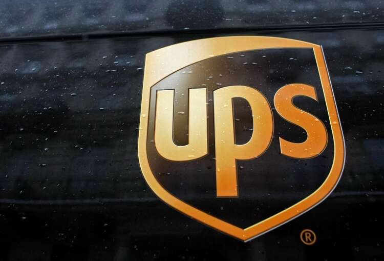 FILE PHOTO: A United Parcel Service logo is seen on a car in center of Warsaw