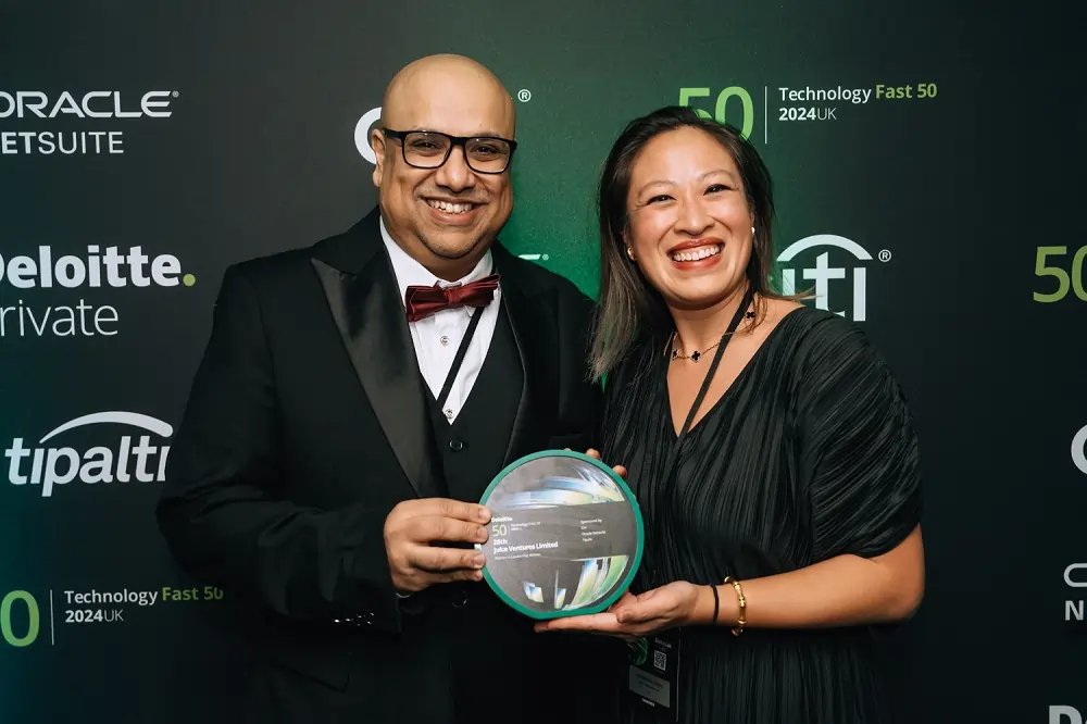 Juice fintech team celebrating their Deloitte Fast 50 ranking - Global Banking & Finance Review