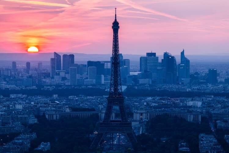 Sunset view of the Eiffel Tower symbolizing Europe’s recovery journey - Global Banking & Finance Review
