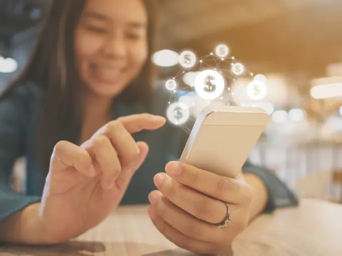 Young professionals engaging with digital banking solutions - Global Banking & Finance Review