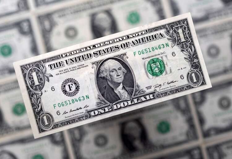 U.S. dollar banknotes symbolizing dollar strength in global markets - Global Banking & Finance Review