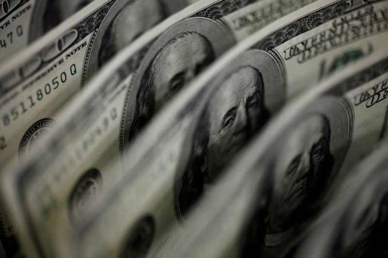 Image for Dollar gains after three-day fall as risk rally takes a breather