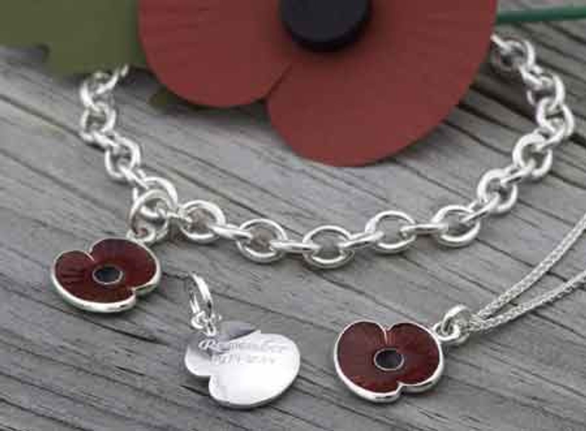Bespoke silver poppy charm designed by Scarlett Jewellery for charity - Global Banking & Finance Review