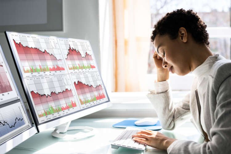 Financial expert analyzing data to combat financial terrorism - Global Banking & Finance Review