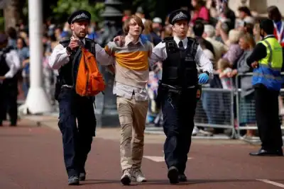 Image for Arrests made after Queen Elizabeth’s military parade interrupted
