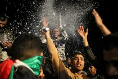 Image for Gazans shed tears of joy, disbelief at news of ceasefire deal