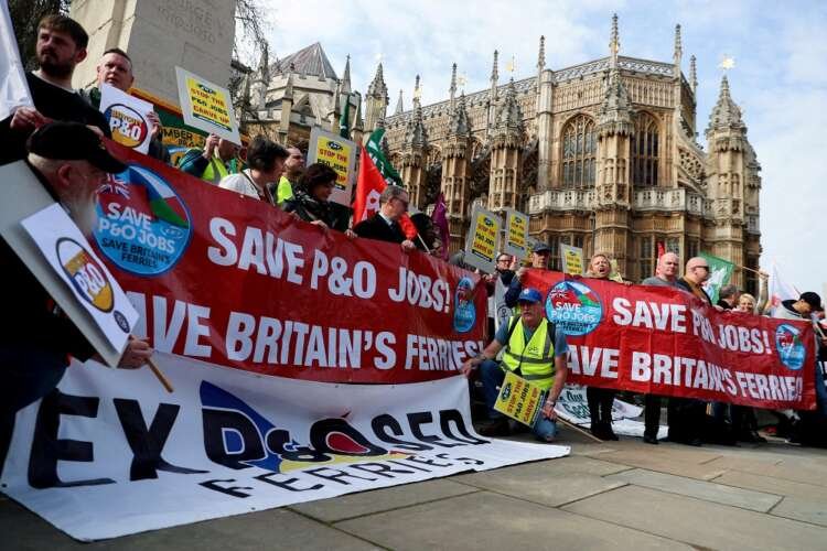 Protesters demonstrating against P&O Ferries' mass firings of employees - Global Banking & Finance Review