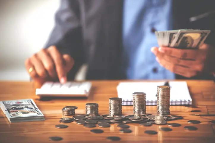 Illustration of financial empowerment concept with cash flow symbols - Global Banking & Finance Review