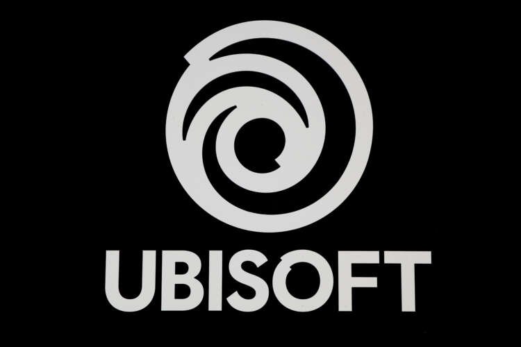 Ubisoft's logo displayed at a video game event, representing their financial strategy - Global Banking & Finance Review